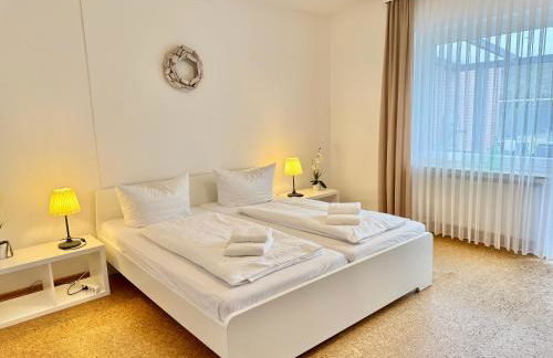 Ferienwohnung im Erdgeschoss mit eingezäunten Garten und Terrasse - Foto 2