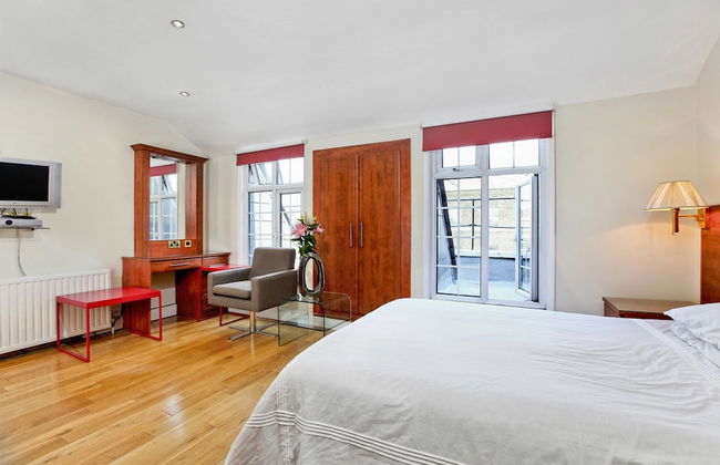 Baker Street Suites - Photo 39