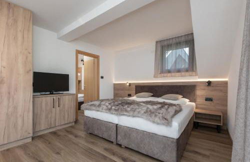 Aparthotel Familiaris - Family Apartments - Pools & Spa in Dolomites - Foto 78