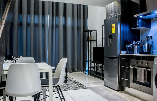 Embassy Gardens Premier Suites - Photo 25