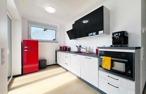 bonquartier - Design Apartment mit Balkon, Arbeitsplatz und Parkplatz - Foto 19