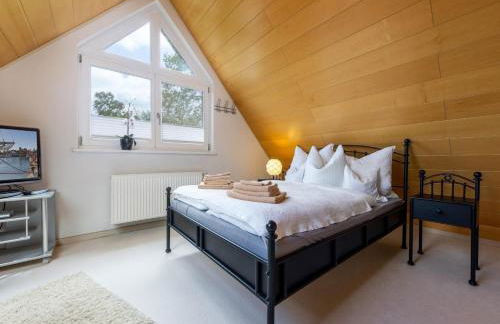 Rügenbrise mit Seeblick - Fewo OG - Foto 24