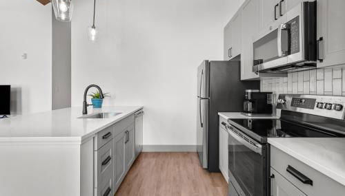 Brick & Bed Riverfront Lofts, G 203 - Foto 5, stove, dishwasher