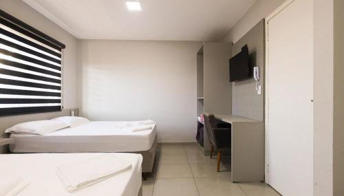 Lou Suítes - Suíte 9 com 2 camas de casal - total confort - Foto 4