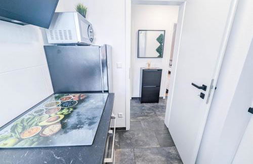 ALFA Stuttgart 3 Zimmer 6 Betten Apartment Wasen MercedesBenz MHP Arena l Bad I Küche l WIFI & SmartTV l 3BR & 6 Beds l Bathroom l Kitchen - Foto 19