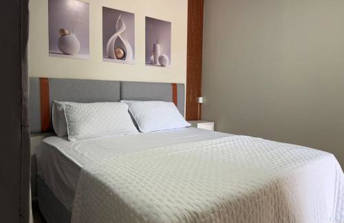 Flat Moderno com Ar e Wi-Fi Rápido a 5min Aeroporto - Photo 1