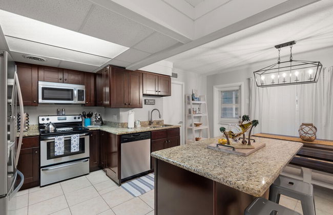 11350 Central Oasis 4BR Pool Home - Photo 18