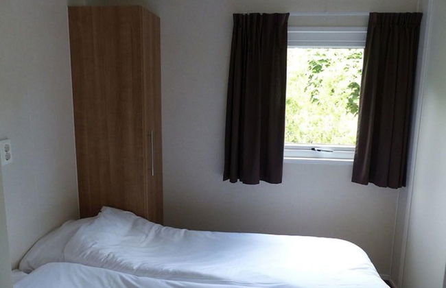 Chalet in Holiday Park With Private Terrace - Photo 2