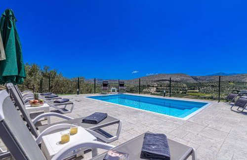 Elysian Stone Villa with Pool & Mountain View - Photo 49