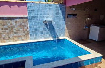 Casa Rosa de Peruíbe - Casa de Temporada 3 dormitórios, 10 hóspedes, piscina, wi-fi, netflix, 800 metros da praia - Photo 50