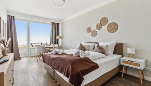 Beachside Grömitz - 21 traumhafte Apartments mit Pool & Sauna direkt am Strand - Foto 2, towels