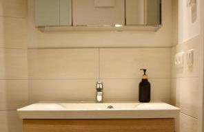 Stilvolle Wohnung mit Balkon & Parkplatz - Foto 18