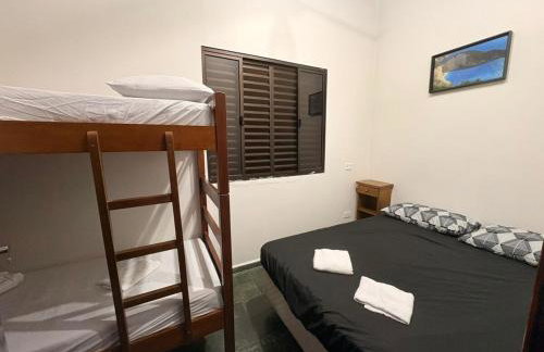 TRIPLEX piscina churrasqueira lava e seca Wi-Fi e 2 TVs em Condomínio com 90m2 no centro de Ubatuba - Foto 6