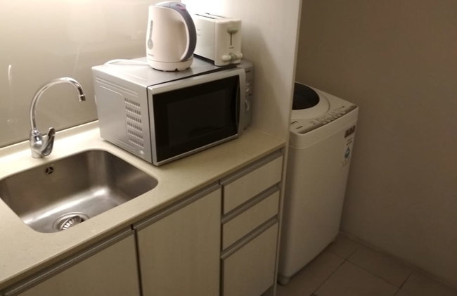 Queens Service Suite at Swiss Garden Residences - Photo 15