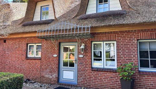 Sky & Sand Homes Strandläufer I Stilvolle Wohnung unter Reet in SPO mit Parkgarten - Foto 2