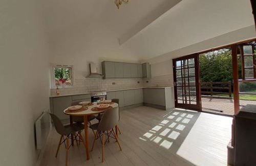 Light & Airy Vaulted Barn Conversion with a View - Photo 32