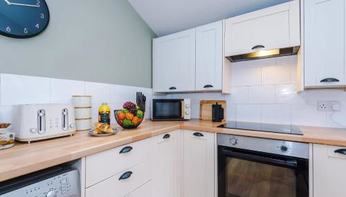 2BR Cottage Retreat Perfect for Work & Relaxation - Foto 4, stove, toaster