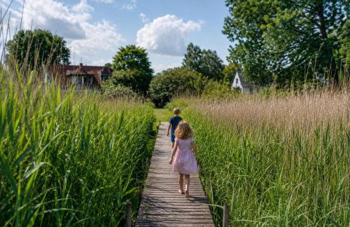 Ferienwohnung - Rügenbrise am Wasser mit Steg und Paddelboot - alles inklusive - Foto 3