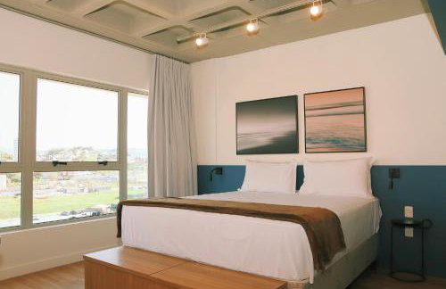 Atrium Studios by Xtay - Studio moderno em Pedra Branca - Caminhe até o Centro Empresarial e Unisul - Foto 1