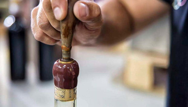 Toro Albala Winery Guided Tour - Photo 4, Corking Toro Albalá bottles