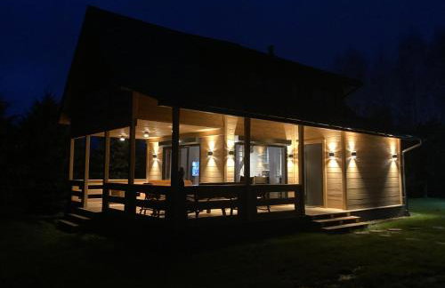 Domek drewniany nad stawem - Foto 1