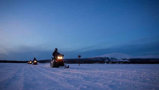 Riding the snowmobiles
