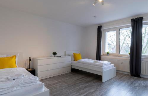 BudgetRoom Modernes Apartment mit 3 Schlafzimmern - Foto 1