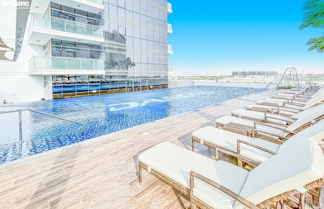 bnbme | Damac Hills Carson Tower | STUDIO - Photo 12