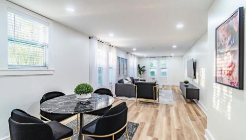 Designer Sun Filled Condo - Walk to Town - Photo 3