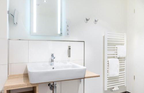 Godewindpark Deluxe-Suite 1-02 mit Ost-Loggia und schönem Gartenblick - Foto 35