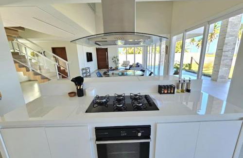 Piscina aquecida, 5 suítes e pé na areia com vista espetacular!! - Photo 17