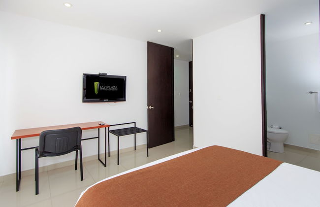 122 Plaza Apartahotel - Photo 8