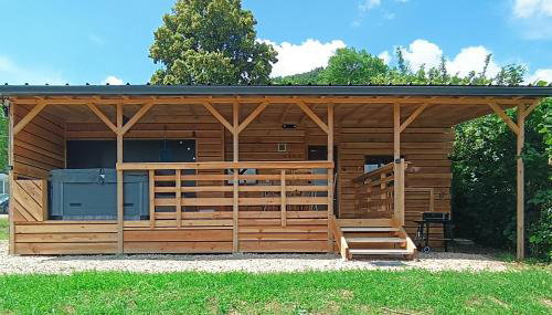 Mobil-home isolé avec jacuzzi - la Cubanière - Foto 1, Garden view