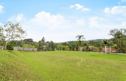 Piscina, jardim, área gourmet e vista arborizada - Foto 16