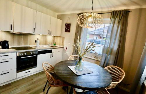 Nessmersiel, Renovierte Erdgeschosswohnung mit Garten, in Deichnähe, Wallbox, - Foto 1