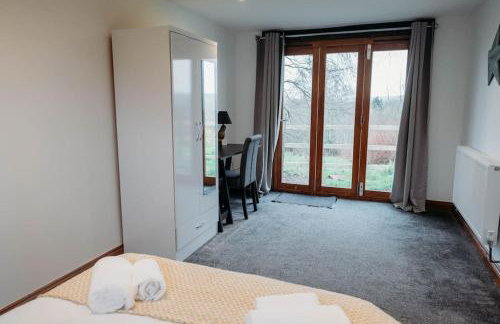 Woodpecker Lodge- A Pet Friendly Rural Retreat - Photo 25