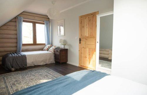 Sielski dom z basenem w Rydzewie - Foto 33