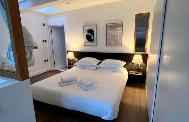 Design Led 1 bed in Cosmopolitan Queens Park - Foto 3