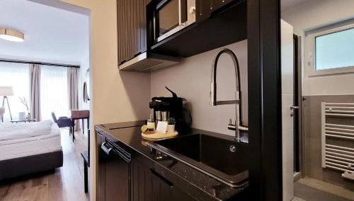 Hochwertige Ferienwohnung in ruhiger Lage mit eigener Terrasse und Parkplatz, nur 7 Gehminuten zum Strand entfernt - hoher Schlafkomfort dank Boxspringbett - Foto 3