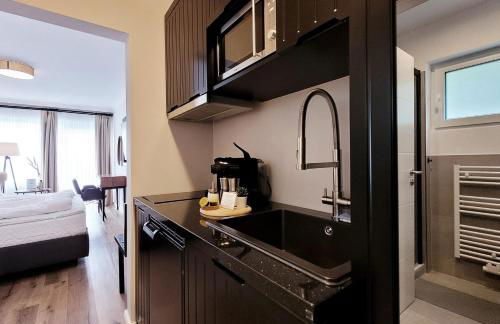 Moderne Ferienwohnung mit Sonnenterrasse & Gartenblick - Strandnah und Parkplatz in ruhiger Lage - hoher Schlafkomfort - Foto 13