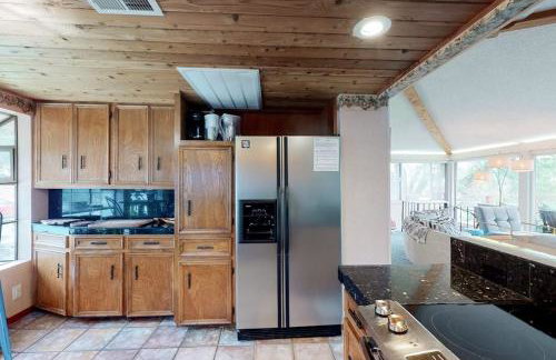 Mid-Century Modern Lake House with Private Waterfront Pool & Boat Dock - Photo 12