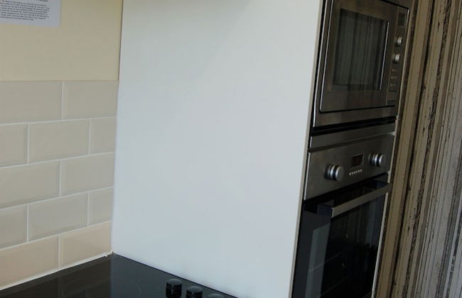 CLOCK TOWER APARTMENTS - Photo 18