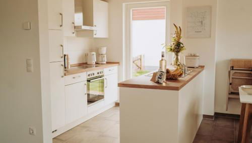 Malerisch am See mit Kamin, Sauna & Whirlpool - Foto 4, stove, minibar