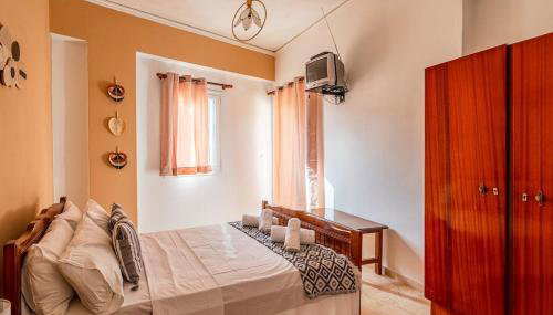 CozyCity2-Bedroom Apartment for3 by Alecos Studios - Foto 2, wardrobe