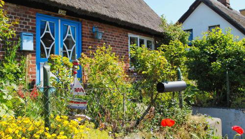 moderne Ferienwohnung mit Gartennutzung - Haus Inselwind FeWo MEERbucht - Foto 3