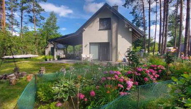 Lawendowy Domek nad jeziorem Szteklin - Foto 1, Garden view