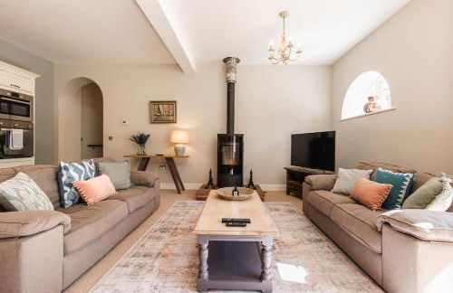 Stylish Coach House Retreat - Foto 1