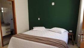 Suíte privativa com ar-condicionado l garagem l cozinha l centro - Foto 2