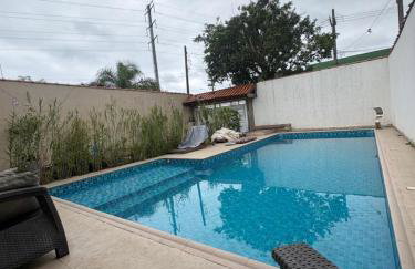 Casa Praia Grande 5min praia, 2 vagas, wi fi , 3 banheiros , piscina grande , freezer extra gelo , churrasqueira , até 9 pessoas - Photo 50