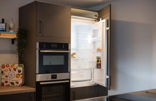 Cozy City Stay 2BR with Sofa Bed - Photo 1